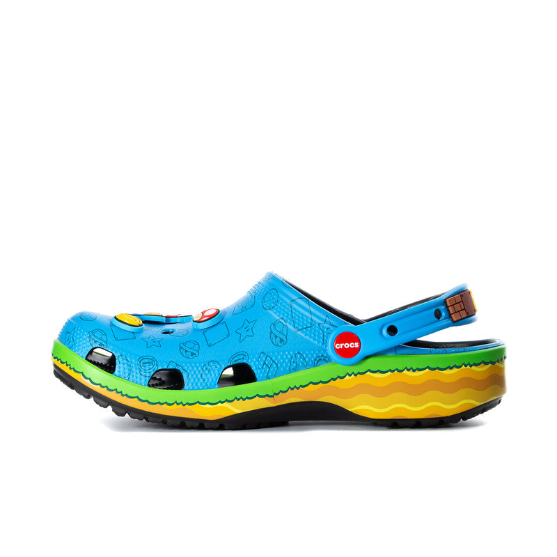 Men's blue classic clog, side view with crocs logo and wavy green-yellow midsole