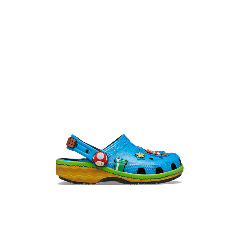 Toddler classic clog in bright blue with Mario graphics and green accents