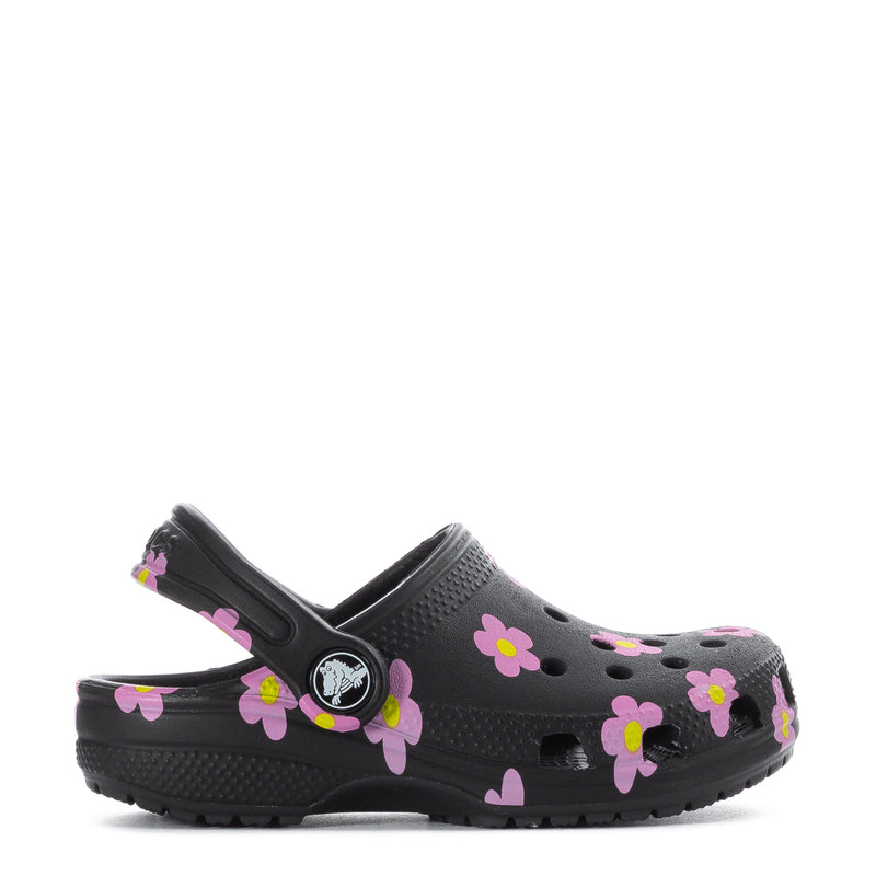 Toddler clog in black with pink flower print, adjustable strap and chunky tread