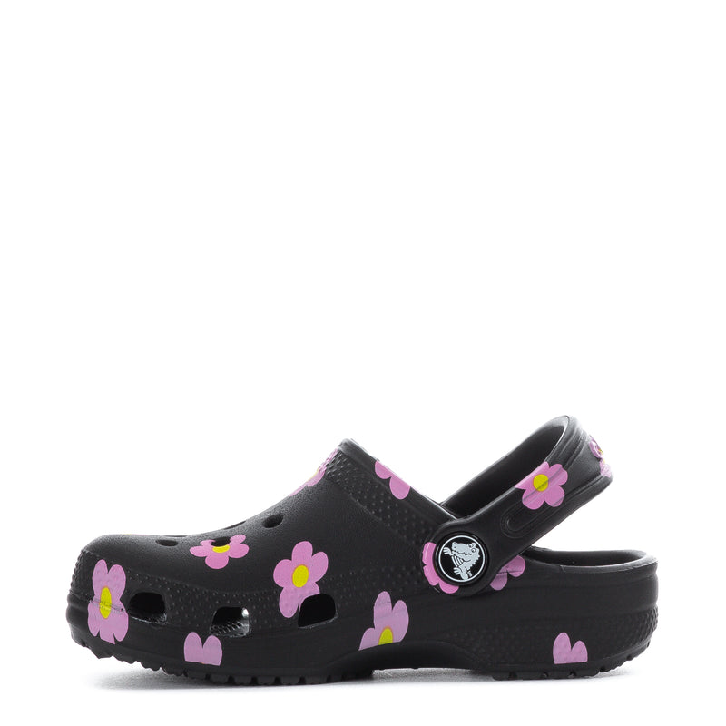Toddler clog in black with pink flowers, side view with hook-and-loop strap