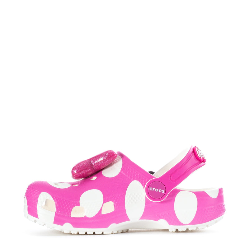 Toddler pink clog with adjustable heel strap and polka-dot pattern