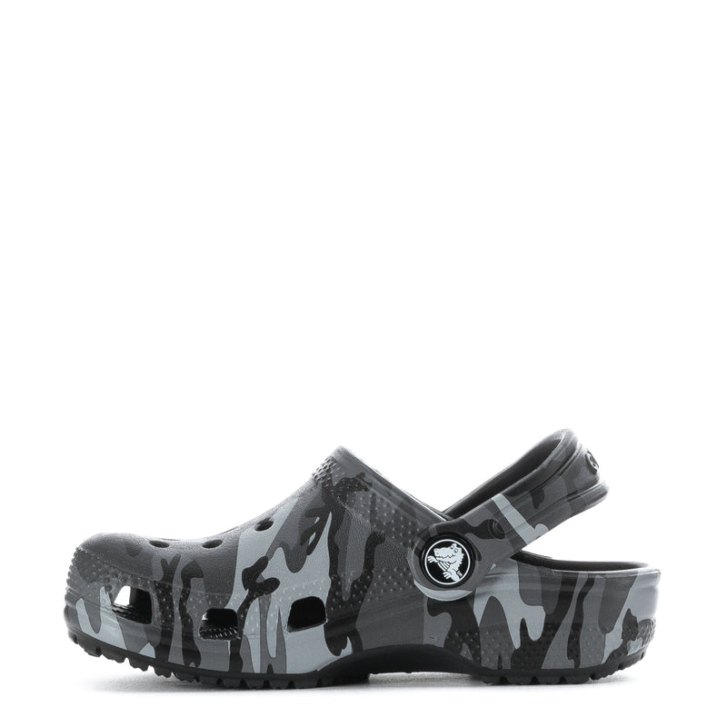 Toddler classic clog side view, gray and black camouflage print, round logo strap
