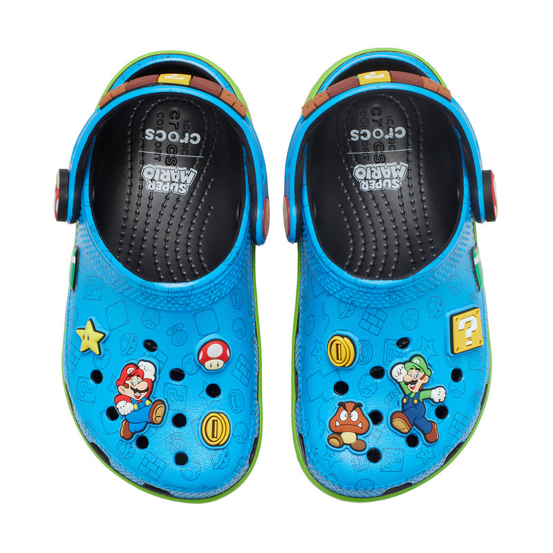 Toddler clog pair, blue upper with cartoon icons and textured interior
