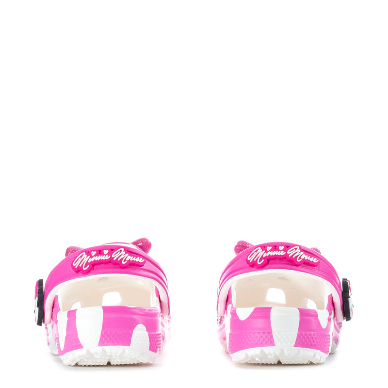 Toddler pink clog with Minnie bow, white polka dots, front view