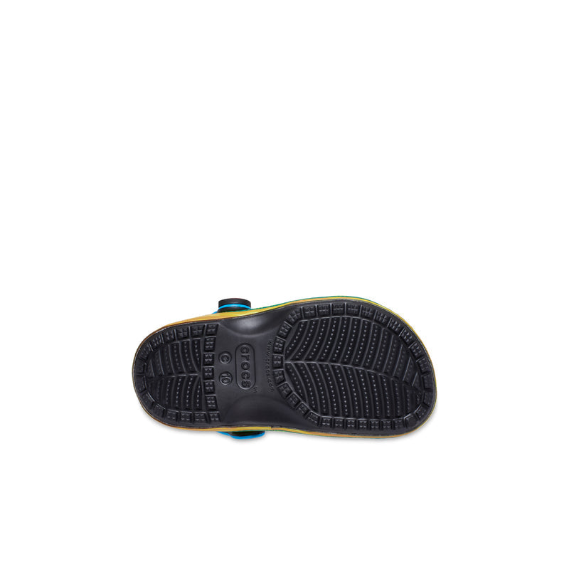 Toddler clog outsole with dark tread and blue heel accents
