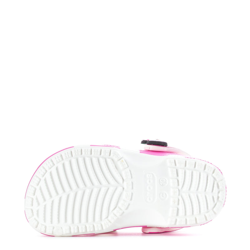 Toddler pink clog sole with traction tread, side view