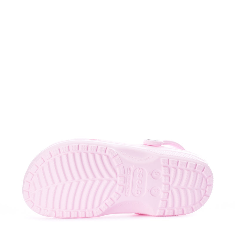 Women's pink clog outsole view with textured tread pattern