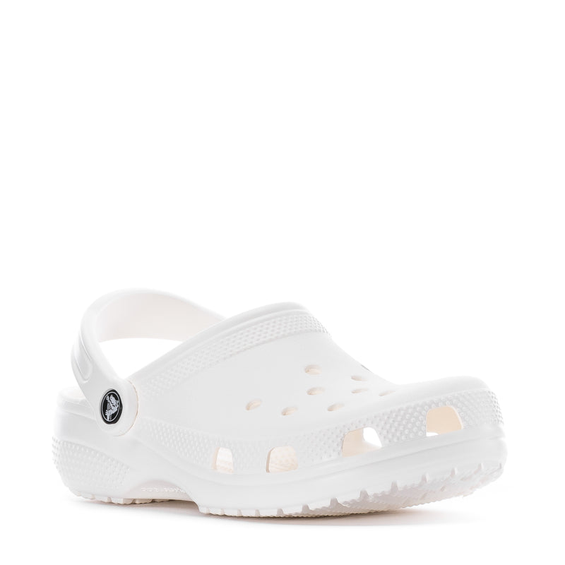 Youth white clog angled view; vented holes and round logo on strap.