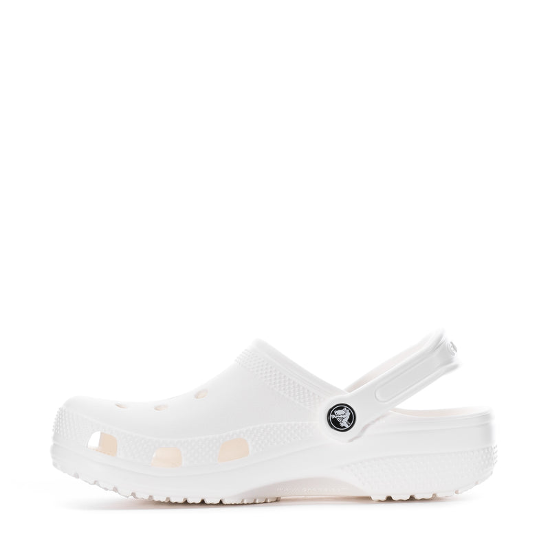 Youth white clog with rear strap; side cutouts and cushioned sole.