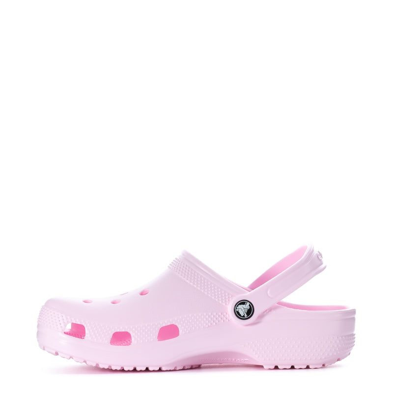 Light pink youth classic clog with perforated upper and adjustable strap