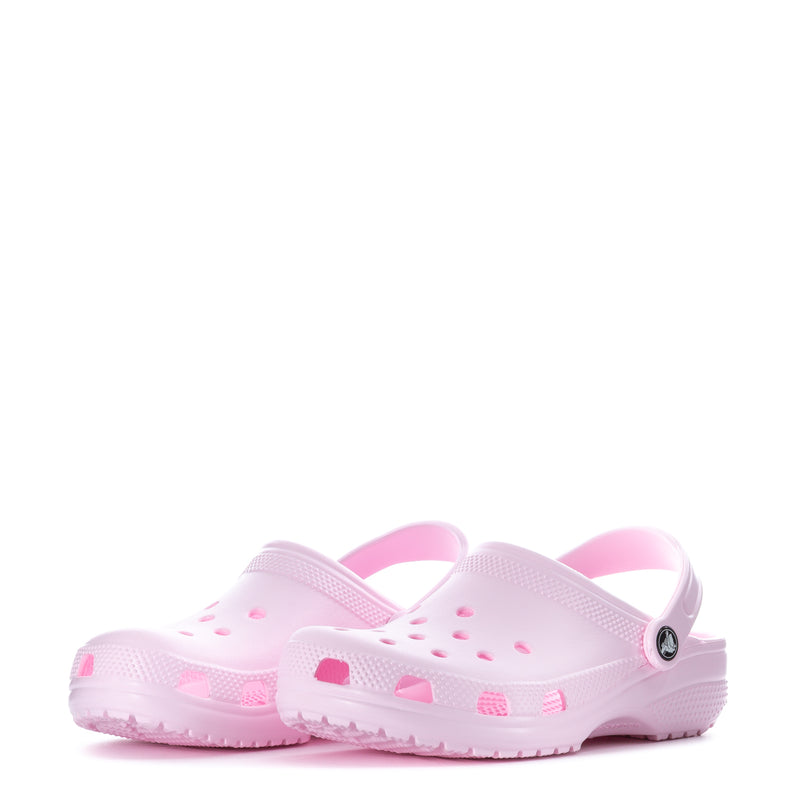 Light pink youth clog pair side view with perforated holes and pink accents