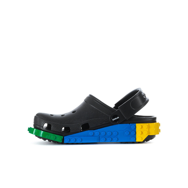Youth black clog with open heel strap and colorful LEGO-style platform sole