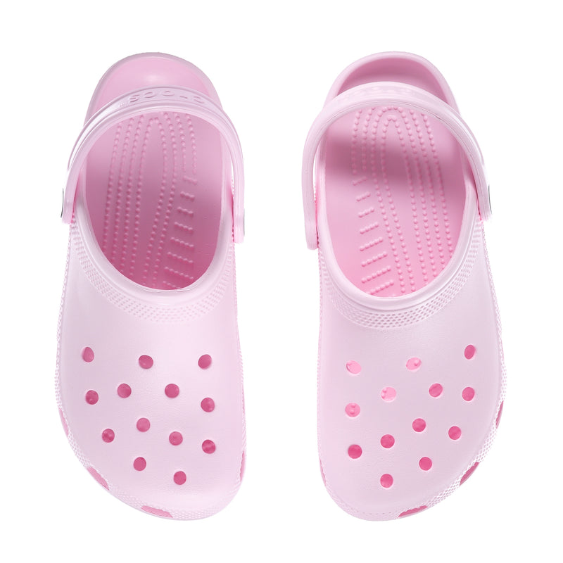Light pink youth clogs with pink dot pattern on the upper