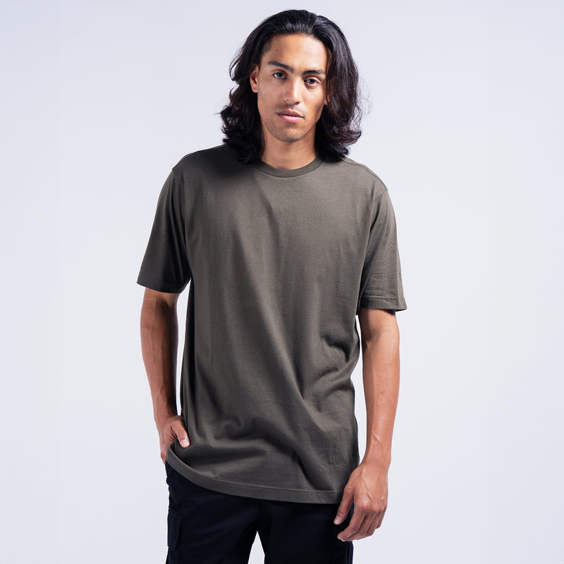 Olive crew-neck T-shirt worn by model, short sleeves