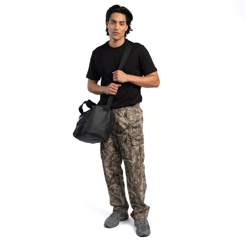 Men's black crew-neck short-sleeve T-shirt worn with a crossbody bag