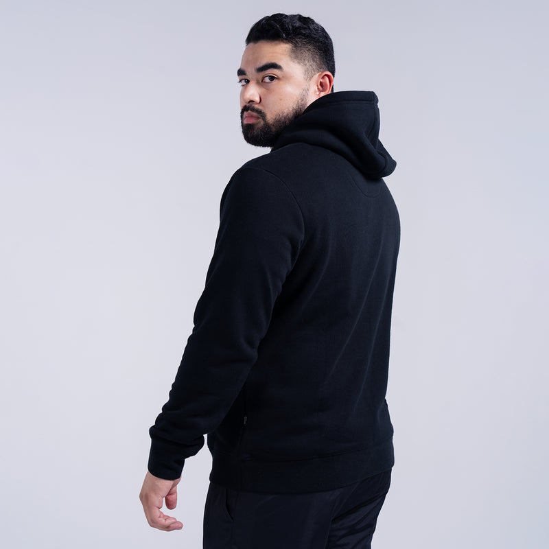 Black fleece pullover hoodie shown from the side, with hood and front kangaroo pocket.