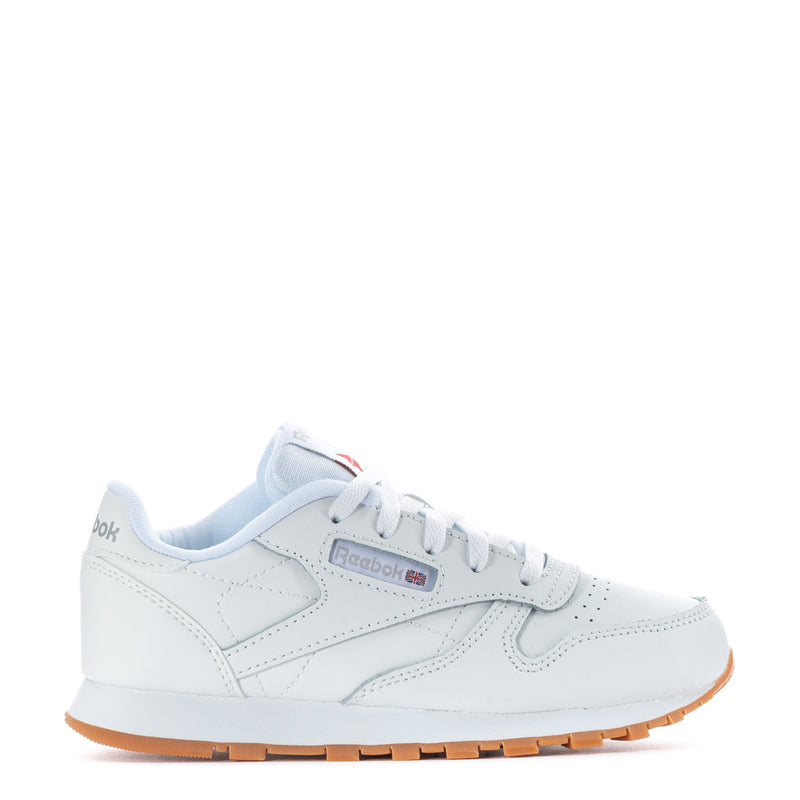 Kids Reebok white leather sneaker with gum outsole and lace-up front