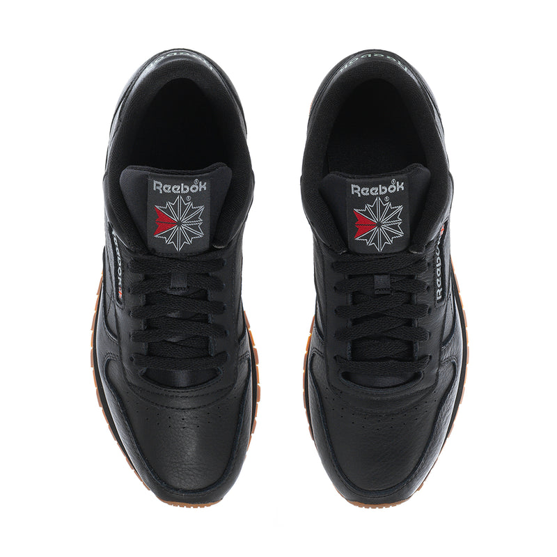 Men's Reebok leather sneakers, black tongue and lace-up front, gum sole edge