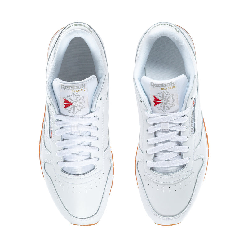 Men's white Reebok lace-up sneakers with tongue logos and perforations, front view