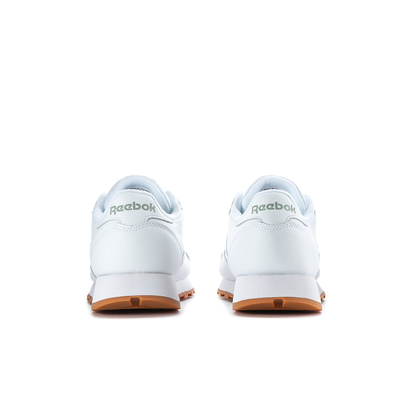Men's white Reebok leather sneakers from heel, with gum-brown outsole trim