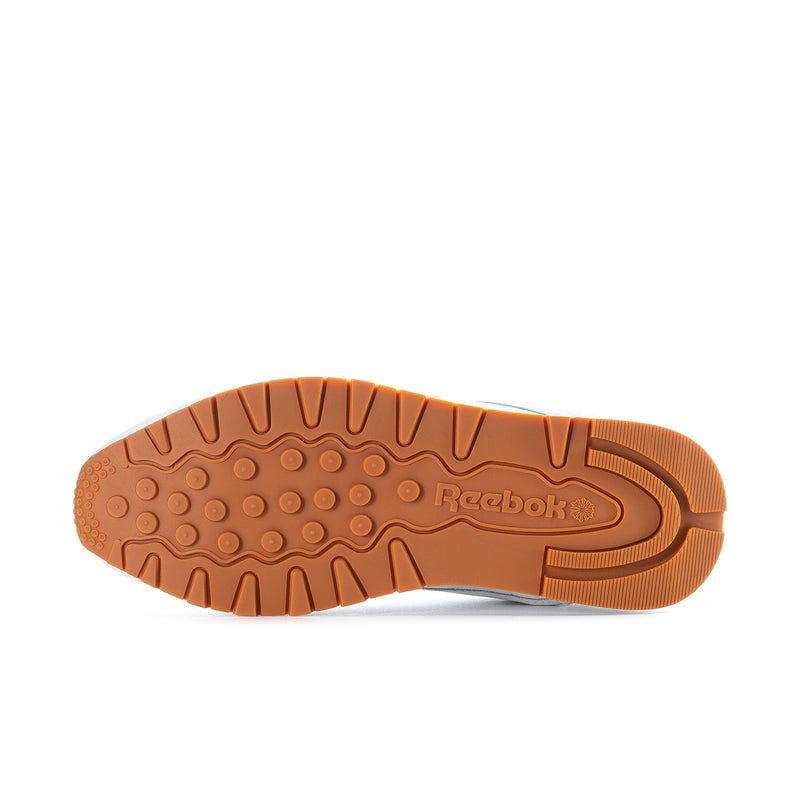 Reebok gum-brown rubber outsole with tread pattern, underside view