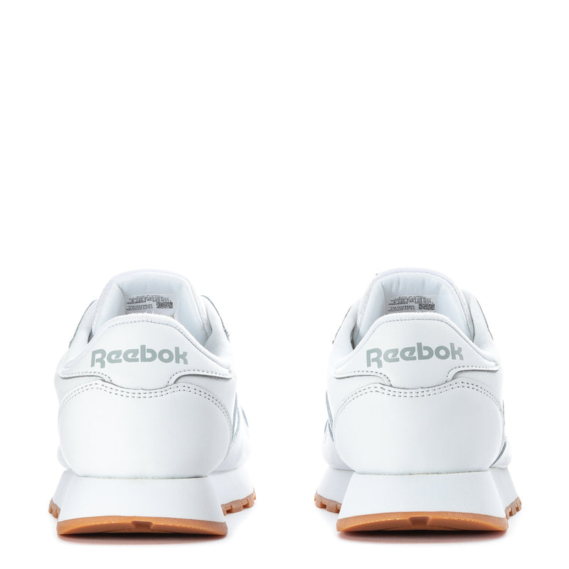 White leather youth sneaker back view with Reebok heel tab and gum sole