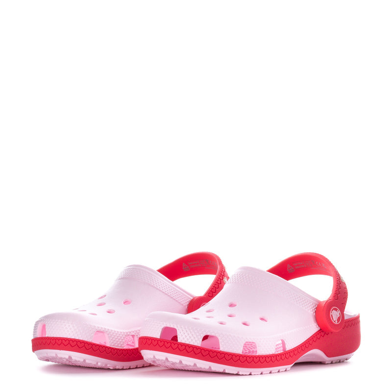 Kids two-tone clog with red backstrap and white upper, heart cutouts and strap