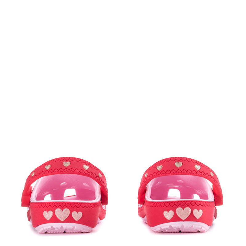 Kids clog heel pair with red back panels and heart designs