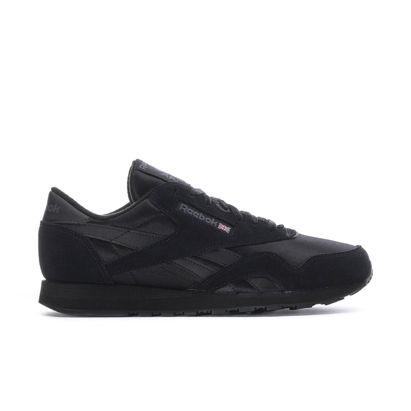 Men's black Reebok low-top lace-up sneakers, side profile with textured overlays