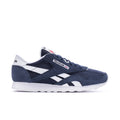 Men's navy suede-style low-top sneakers with white Reebok stripes and lace-up.