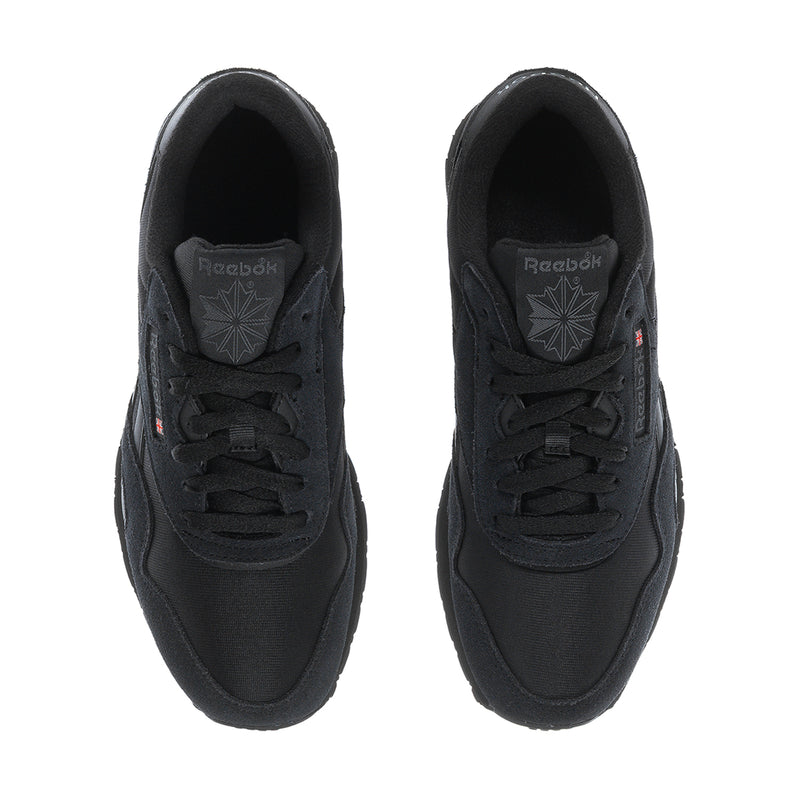 Men's black Reebok low-top lace-up sneakers, front close-up with tongue logo