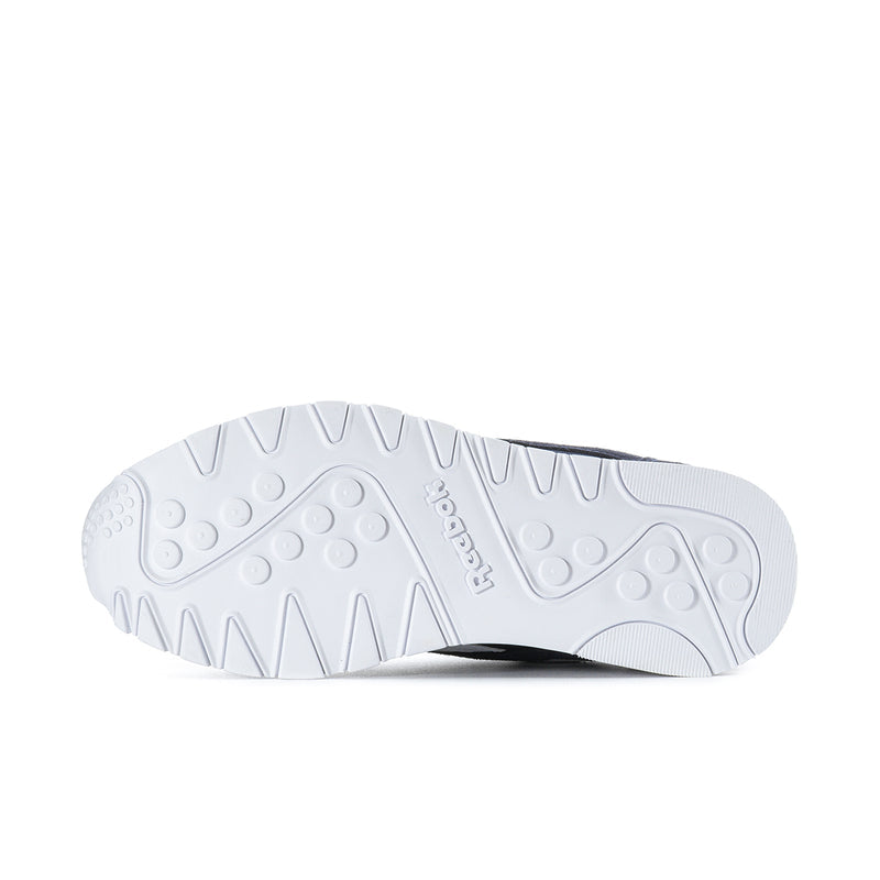 Men's sneaker outsole with textured tread and white rubber base.