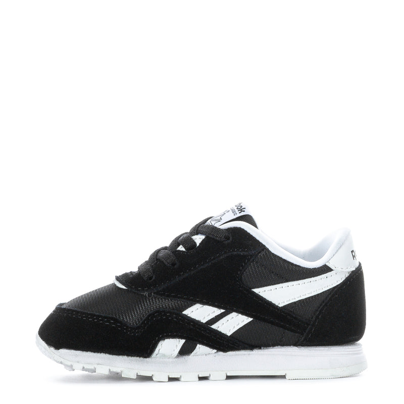 Toddler black and white Reebok sneakers, side view with white midsole