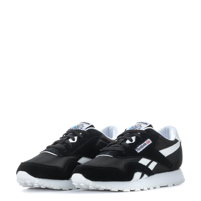 Reebok youth pair of black-and-white lace-up sneakers with cushioned collar