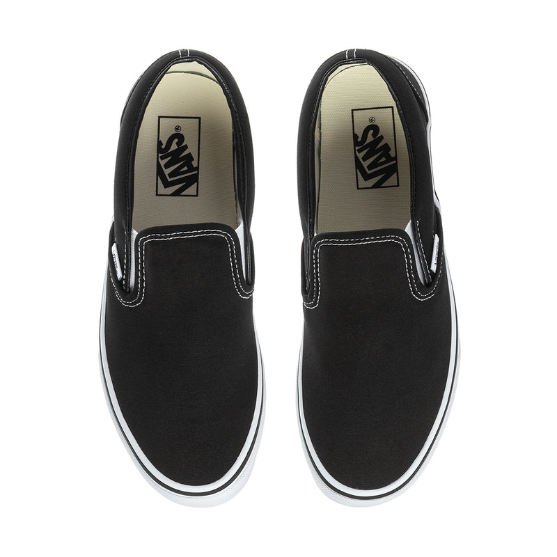 Vans men's classic slip-on sneakers, black with VANS logo insole and white edge.