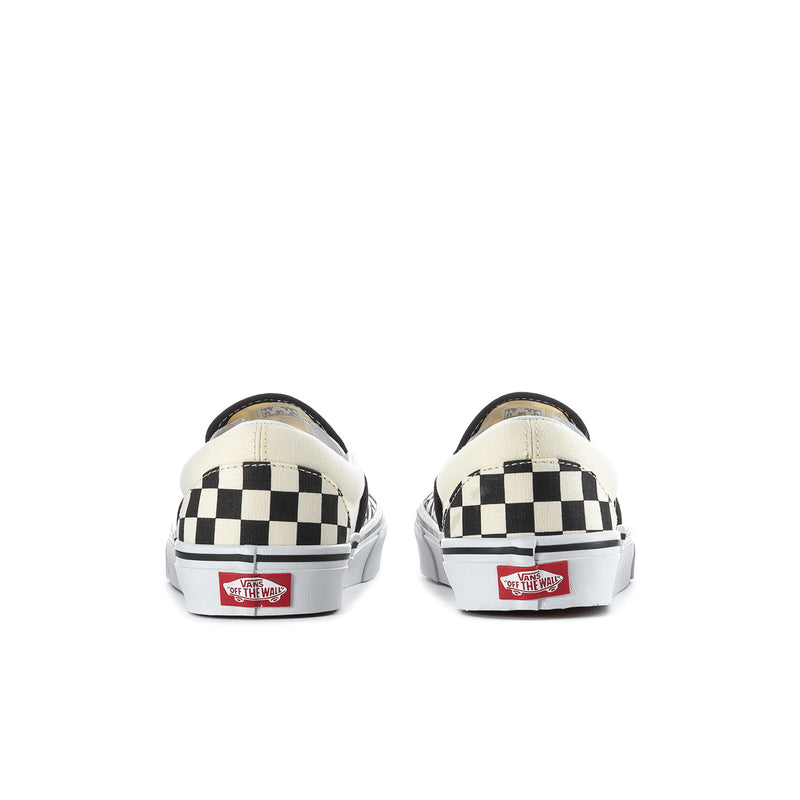Vans slip-on sneakers in black/white checkerboard with rear label, white rubber sole
