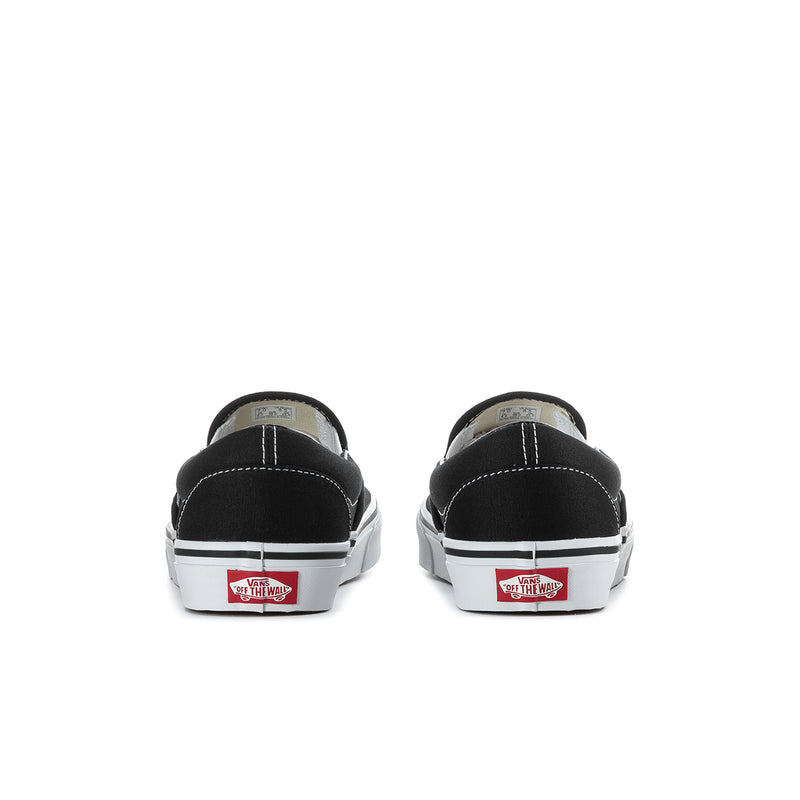 Vans men's classic slip-on sneakers, black heel with white rubber sole.