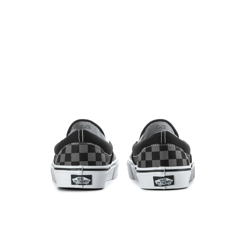 Black slip-on sneakers with rear heel branding and checkerboard uppers