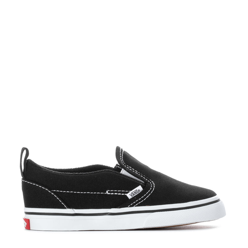 Black toddler slip-on sneakers with white stitching and Vans side logo