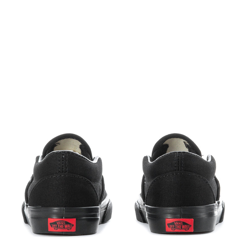 Black toddler slip-on sneakers showing heel branding and rubber cup sole