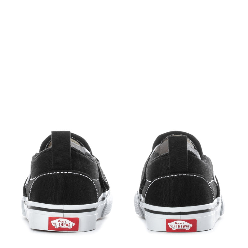 Black toddler slip-on sneakers, rear view, with white stripe and logo patch