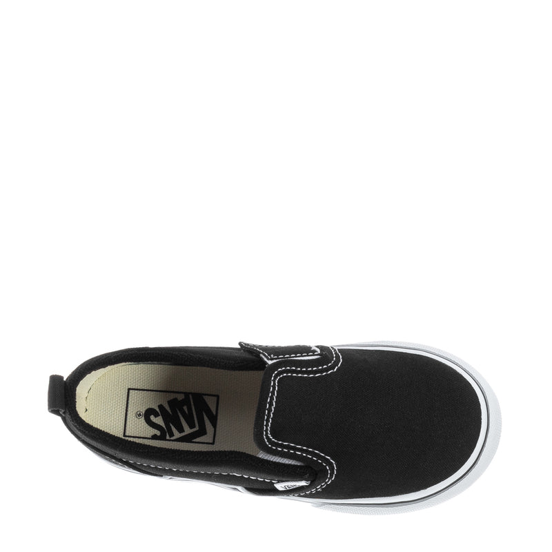 Black toddler slip-on sneaker showing beige interior label and white piping