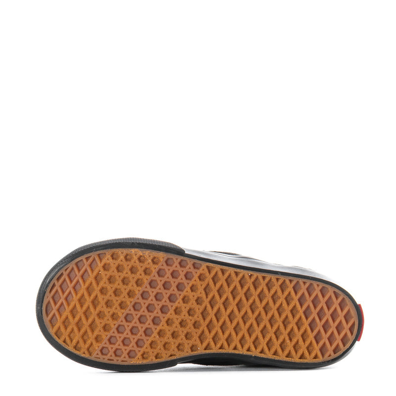 Black toddler slip-on sneakers outsole with textured tread and gum-color bottom