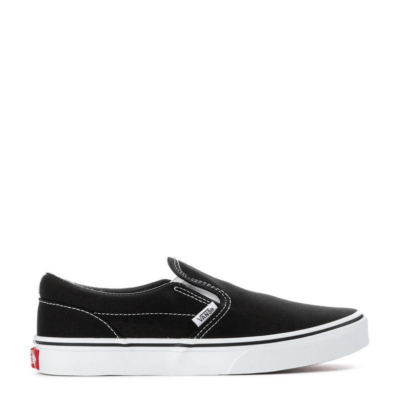 Youth black slip-on sneakers with white midsole and side stripe stitching
