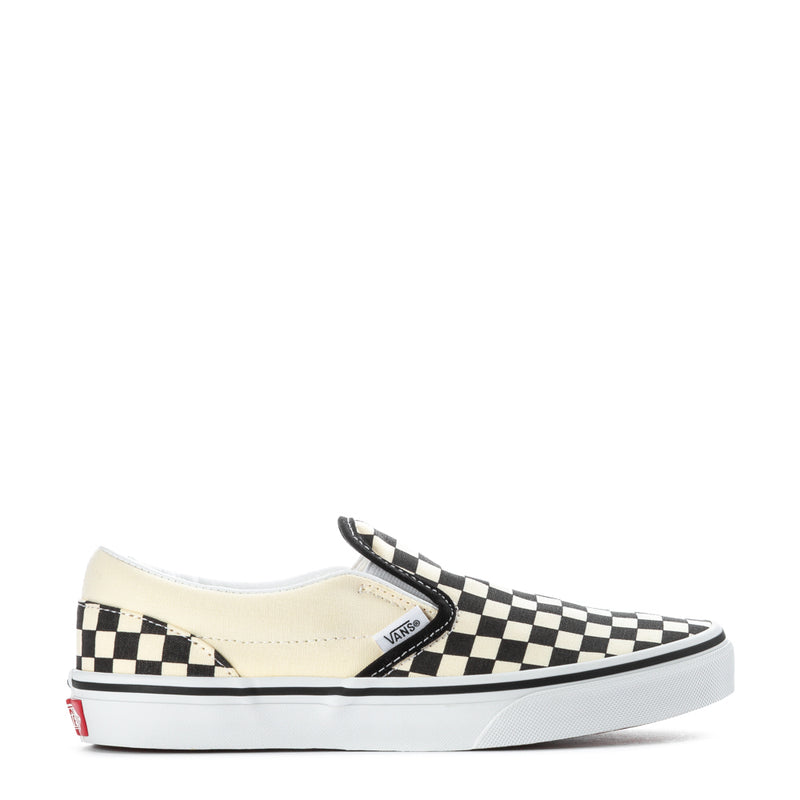 Youth slip-on sneakers with black-and-white checkerboard canvas and white rubber sole