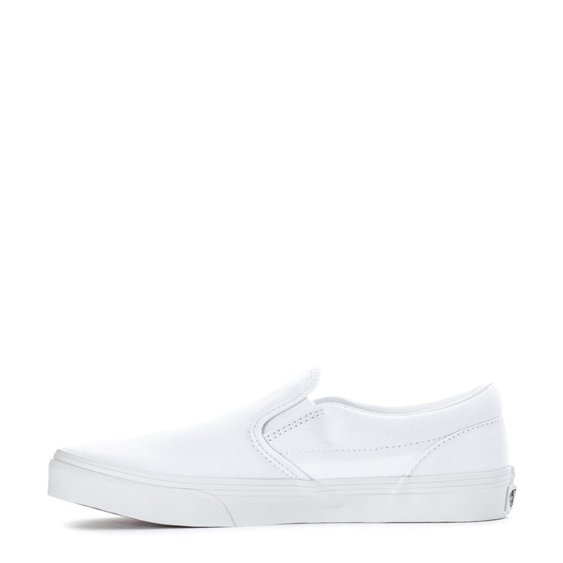 Youth white slip-on sneakers, side view with cushioned collar and low platform sole
