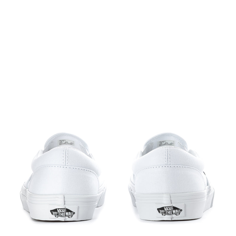 Youth white slip-on sneakers, back view with branded heel tabs and rubber sole