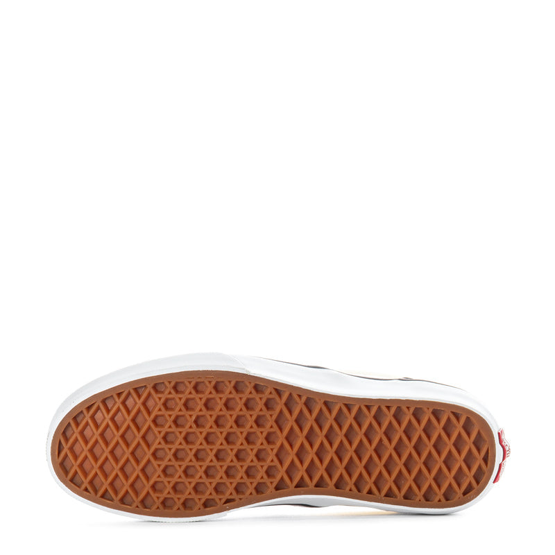 Youth slip-on sneaker outsole with brown gum tread and white rubber edge