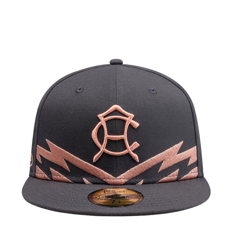 Dark grey baseball cap with coral logo and chevron side embroidery