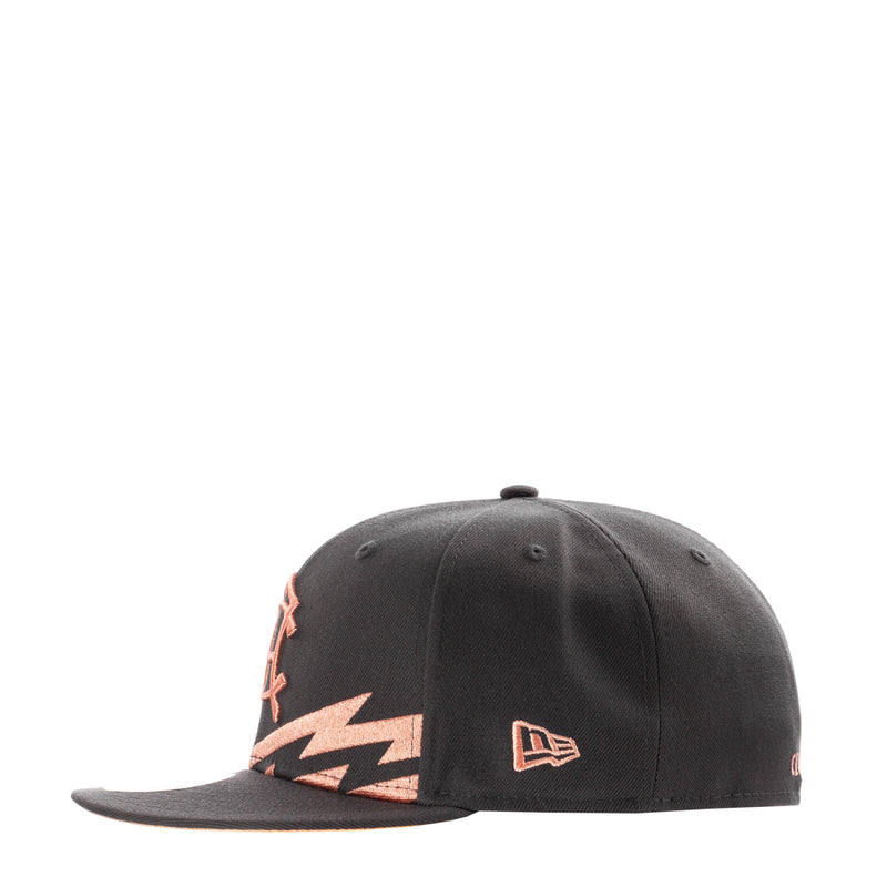 Dark grey baseball cap with coral side emblem and small New Era logo